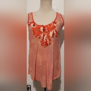 Language orange and white top